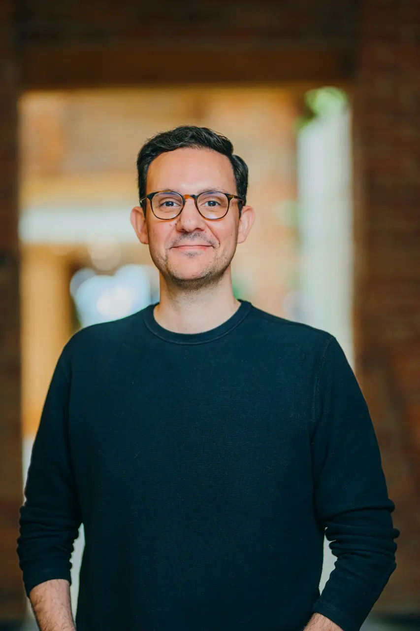 A headshot of Mohamed Omar.